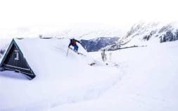 img_gal_0_14 Skier jumps off roof top of backcountry hut